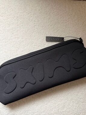 Black SKIMS Neoprene Zip Pouch